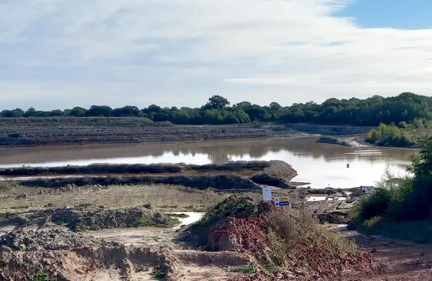 View of quarry lake undergoing dewatering and restoration works in West Sussex as part of a Sykes Pumps water treatment project.