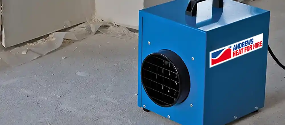 Portable electric heater used on a construction site, showcasing practical benefits explored in portable vs fixed heaters comparisons.
