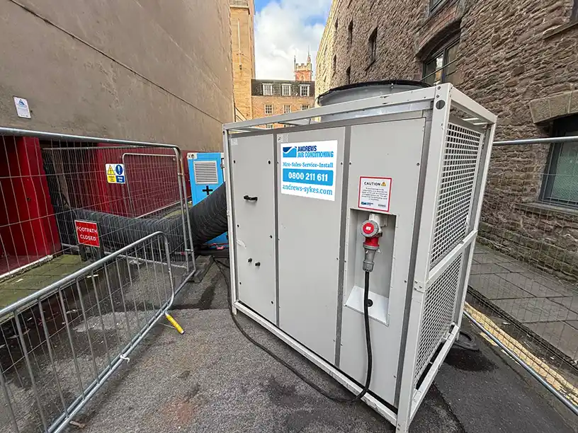 HPAC45 high performance air conditioner installed externally with ducting providing cooling to theatre server room