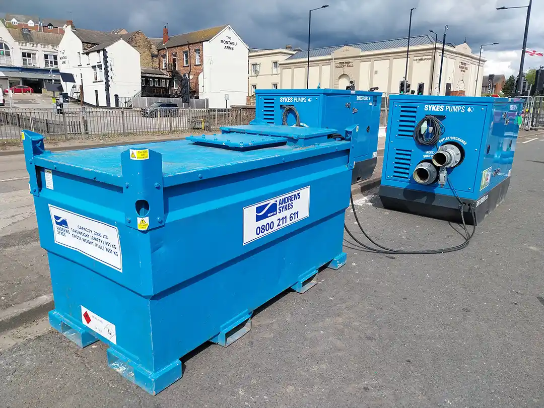 Temporary pipework diverting wastewater flow during sewer maintenance works