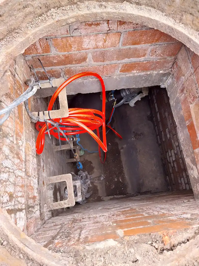 Sewer Bypass Access Chamber Access chamber prepared for temporary overpumping and sewer bypass operations