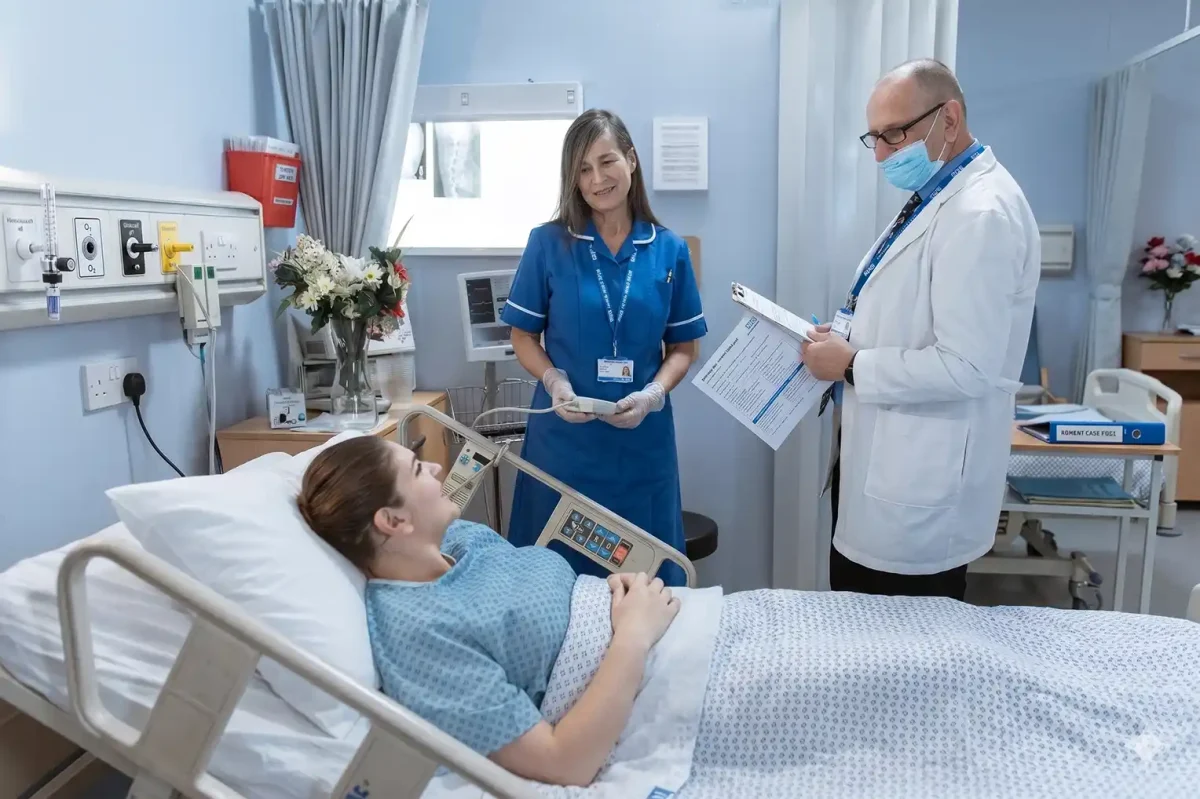 Healthcare Cooling Support for Renal Unit Healthcare staff with patient in hospital room with temporary cooling and HEPA filtration