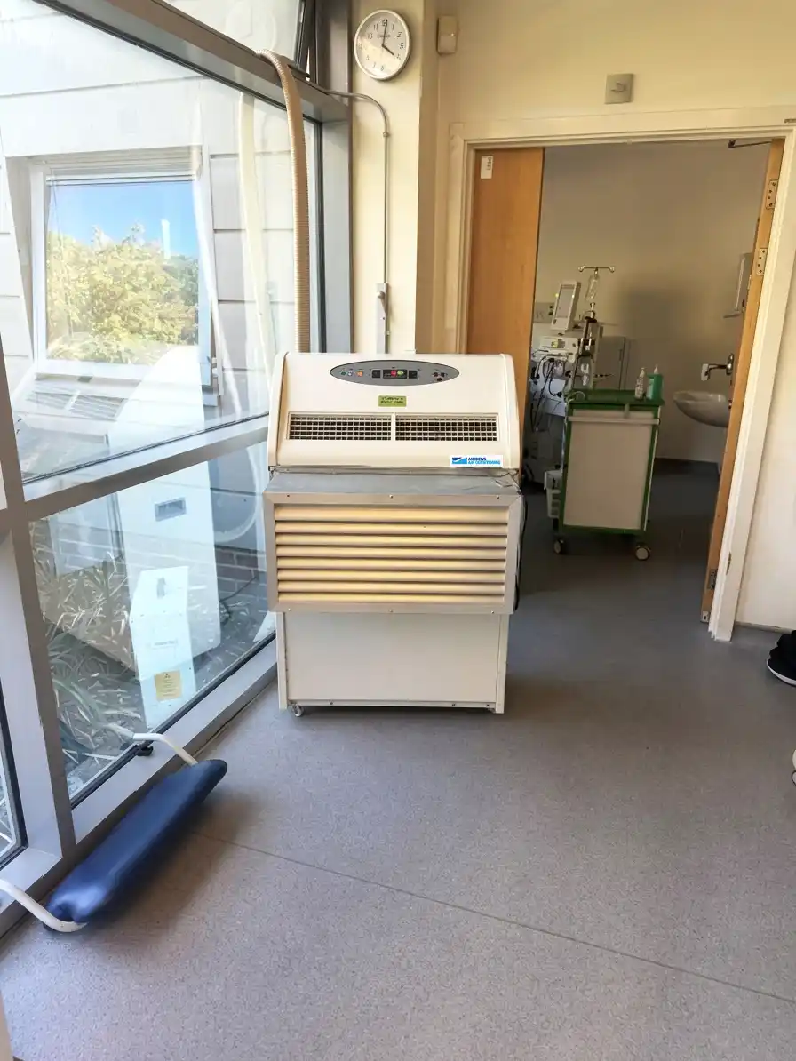 https://www.andrews-sykes.com/wp-content/uploads/2026/08/PAC22-Unit-Supporting-Dialysis-Area.webp PAC22 air conditioning unit providing filtered cooling in a hospital dialysis area