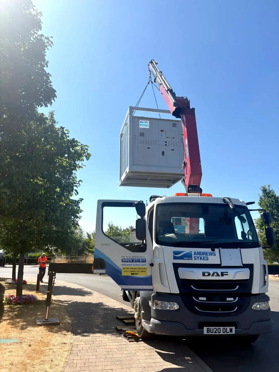 chiller installation for major golf event Andrews Sykes chiller being lifted into position as part of a temporary cooling installation for a major golf event.