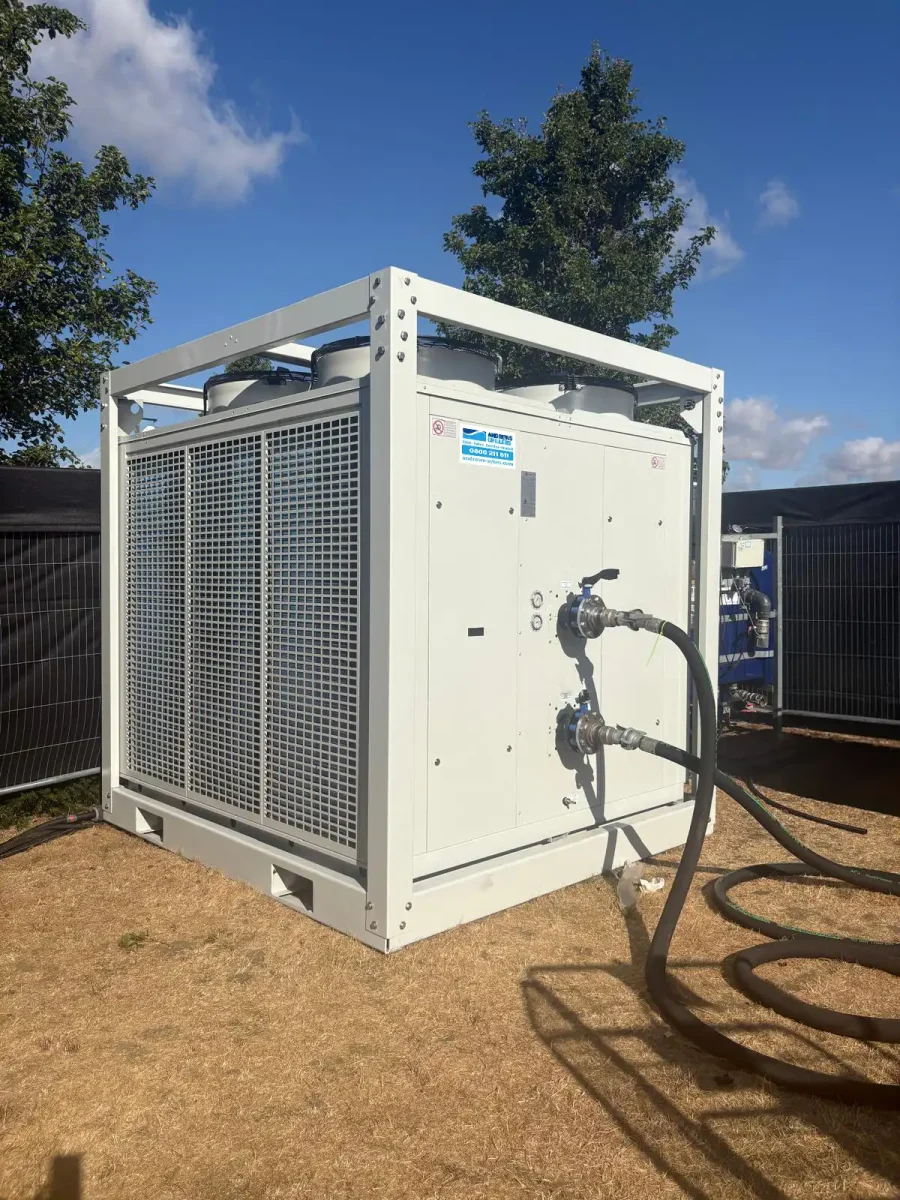 150kw hp fluid chiller for temporary event cooling 150kW HP Fluid Chiller installed outdoors to provide temporary event cooling for marquees at a televised golf event.