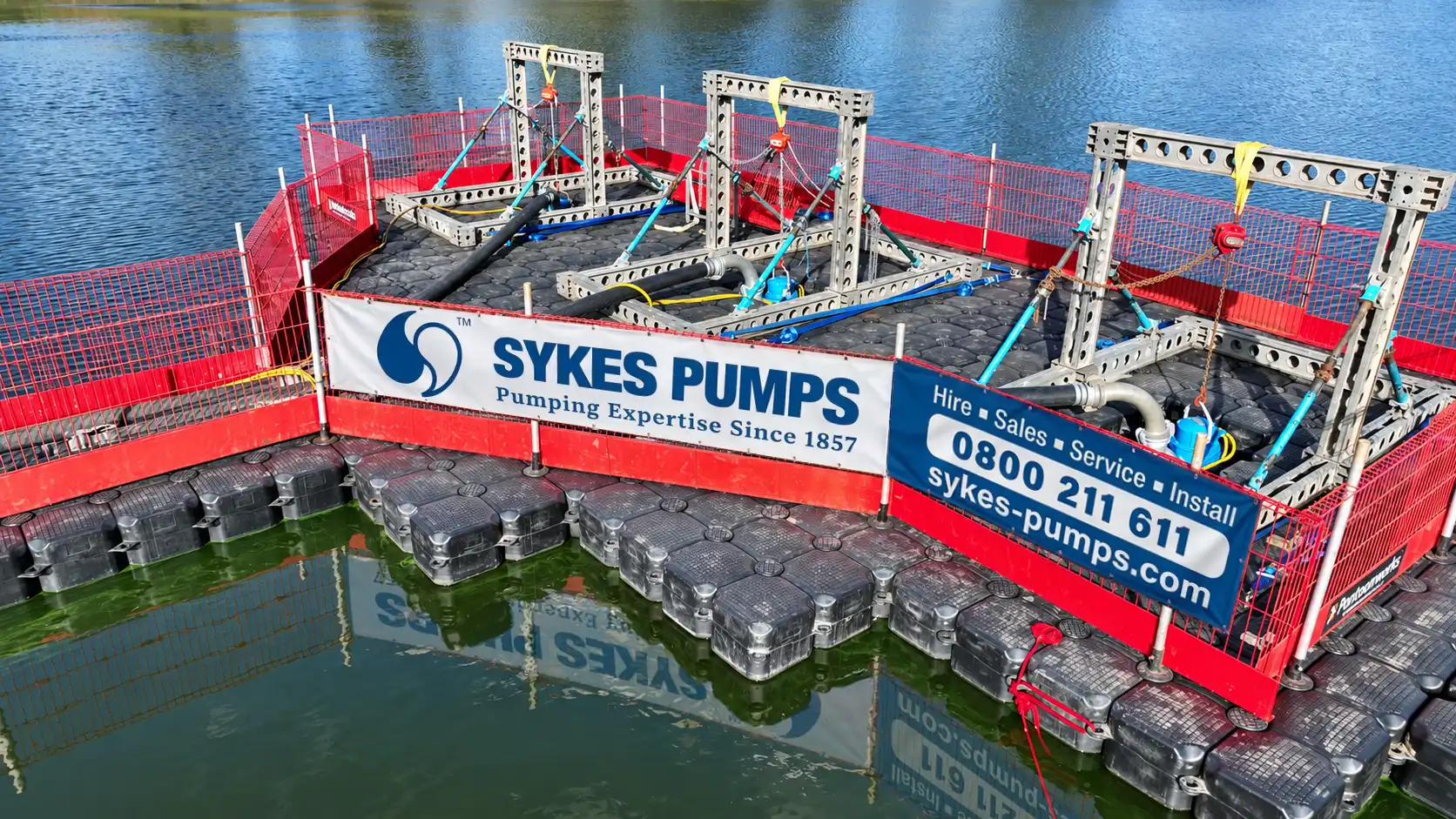 Three PX22 submersible pumps on a Sykes Pumps floating pontoon, holding a reservoir level for penstock inspections
