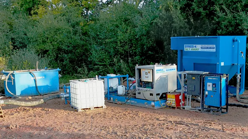 Lake Dewatering & Water Treatment Equipment – Sykes Pumps Silt Away System in West Sussex Sykes Pumps Silt Away system with chemical dosing and monitoring equipment used for lake dewatering and water treatment in a West Sussex quarry.