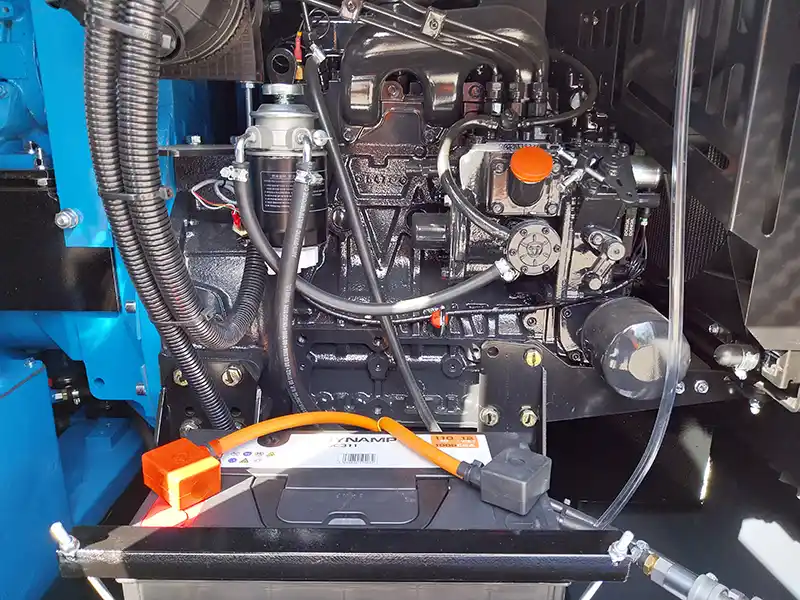 Detailed view of the SH150 SS Eco’s modern Tier V compliant engine system and internal wiring